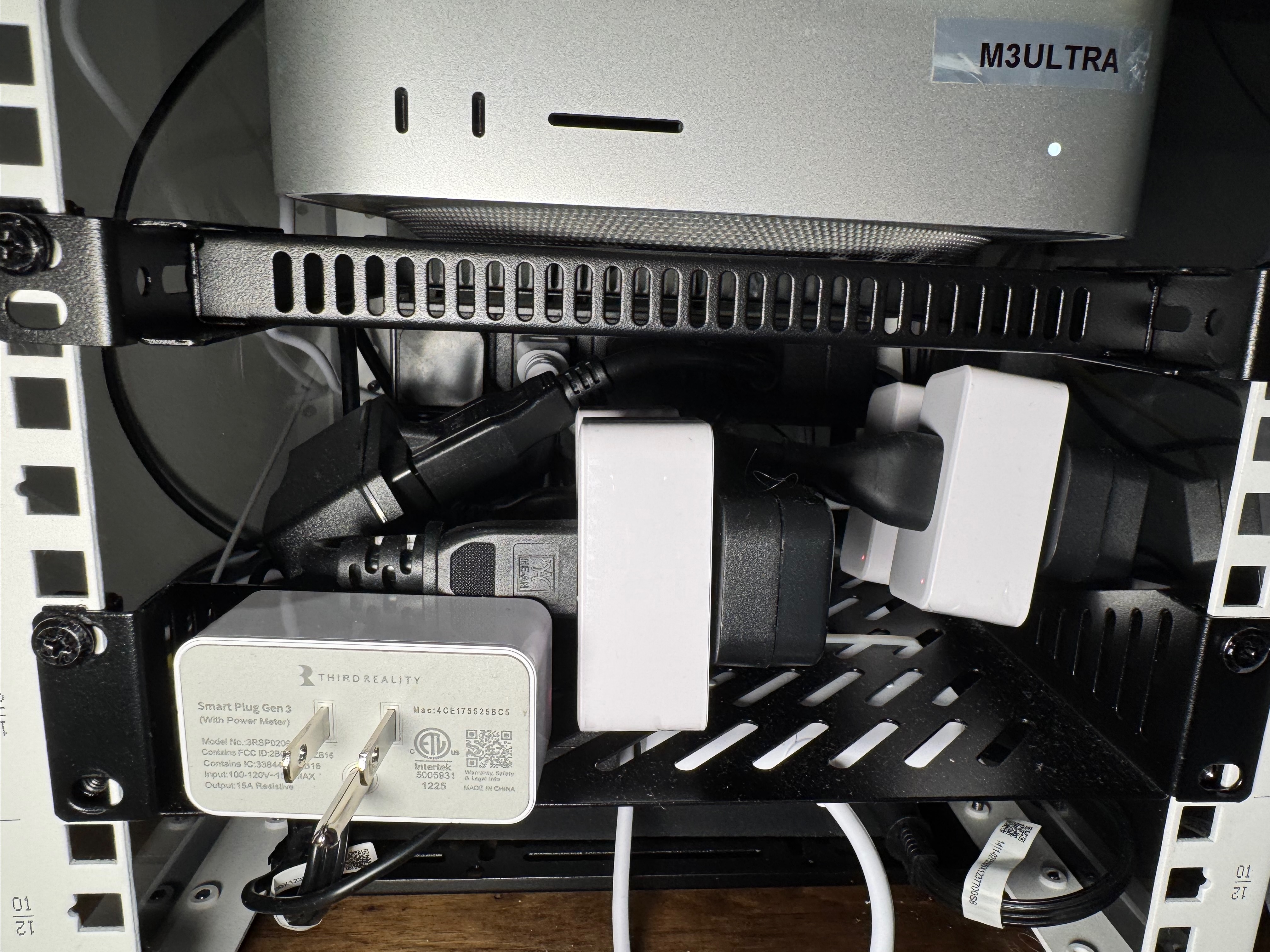 ThirdReality Smart Plug Gen3 installed behind a Mac in the lab rack.