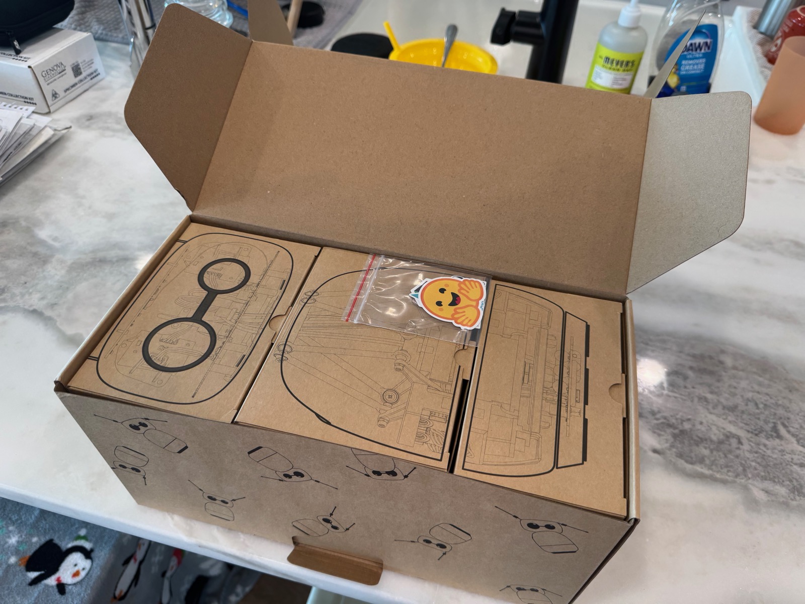 Inner boxes with printed part blueprints